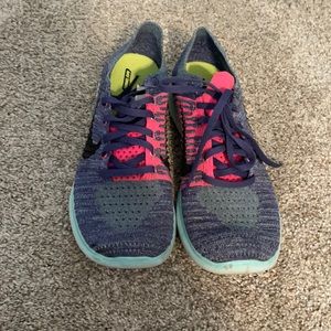 Blue and pink Nike running shoes size 9